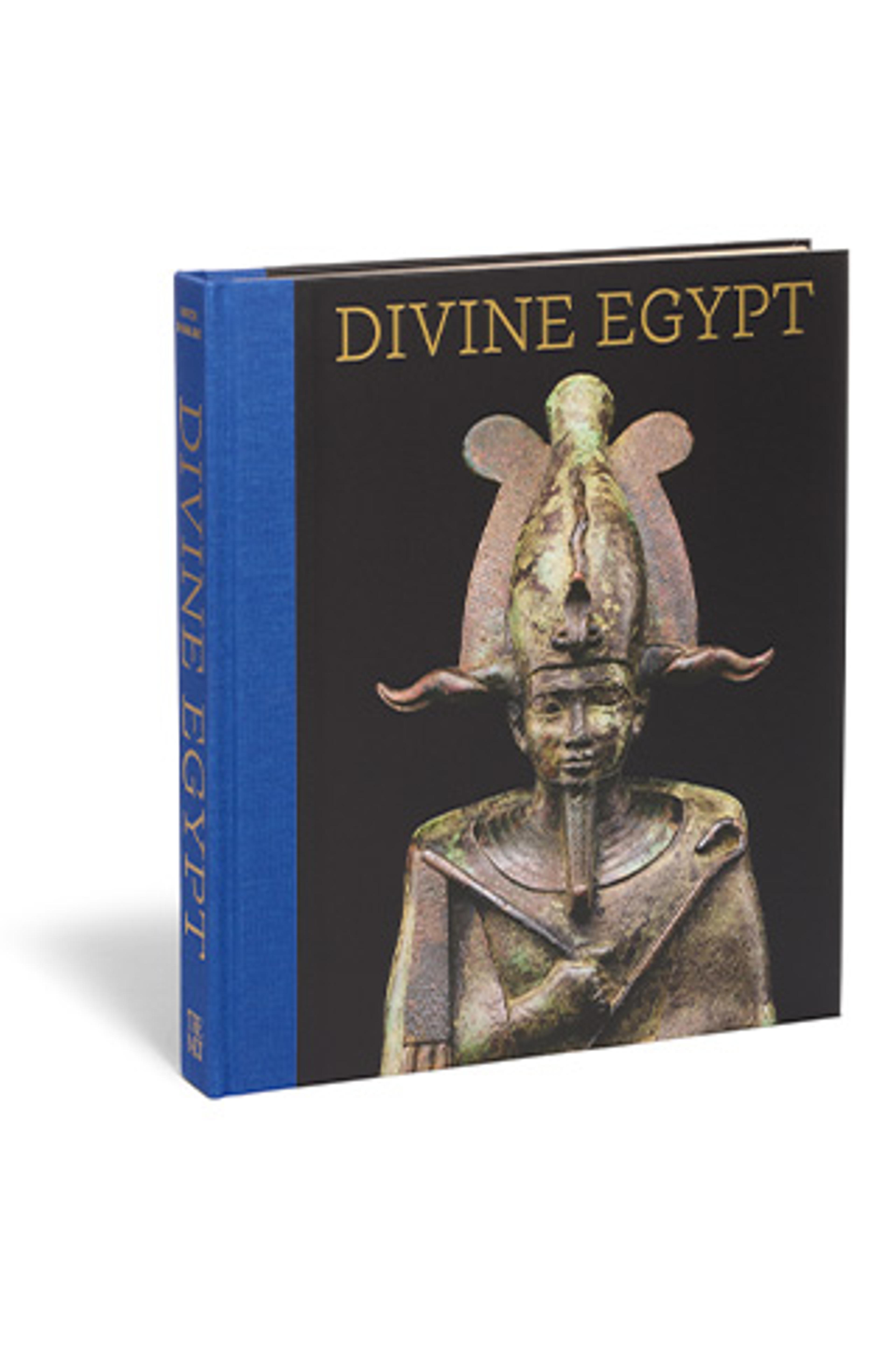 Cover of the book 'Divine Egypt' featuring an ancient Egyptian statue with intricate headdress. The book spine is blue with gold text."