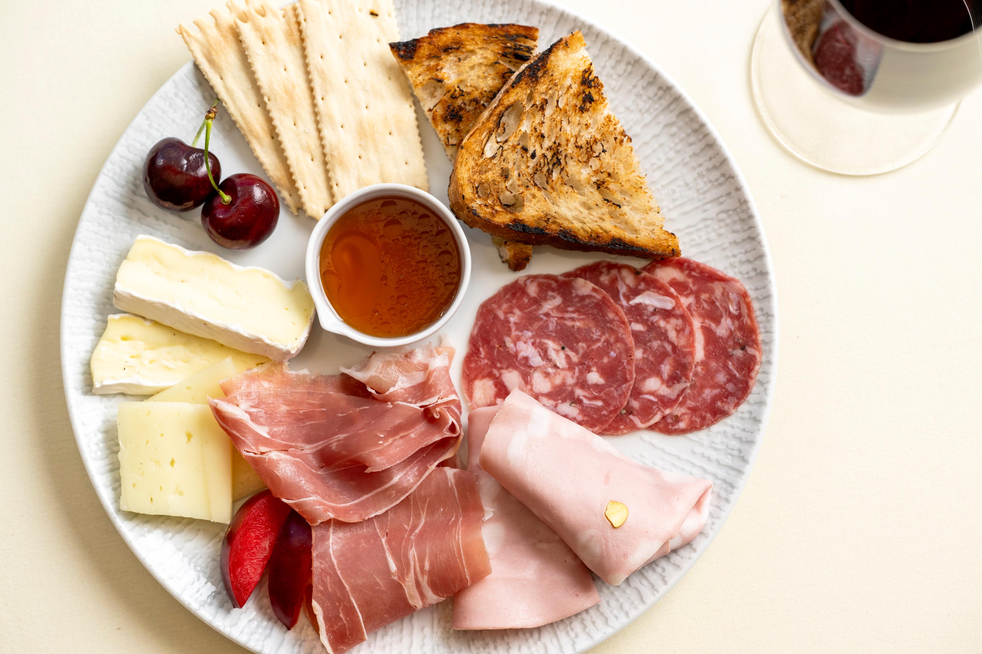 A charcuterie plate photographed from above.
